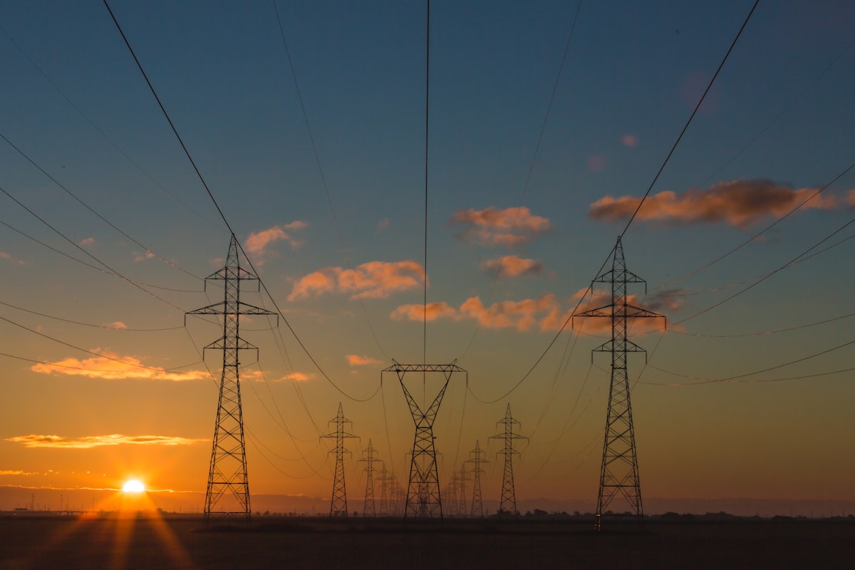 Transmission lines and power infrastructure at dusk